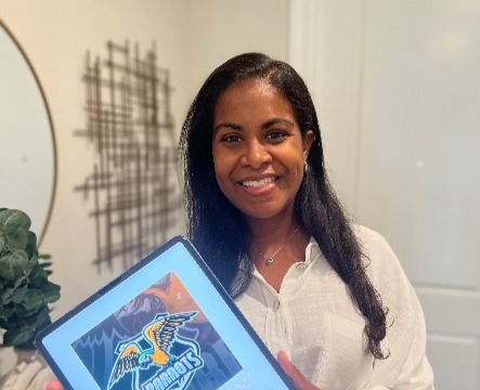 A person holding a tabletDescription automatically generated